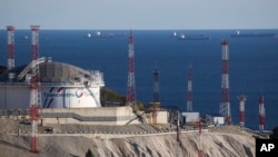 Oil tankers are seen at the Sheskharis complex in Novorossiysk, one of the largest facilities for oil and petroleum products in southern Russia. 