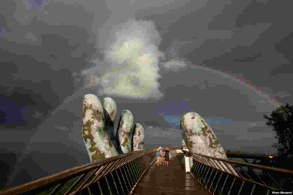 A double rainbow appears above the Gold Bridge on Ba Na Hill near Danang, Vietnam. (Reuters/Kham)