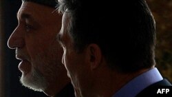 Președintele afgan Hamid Karzai și secretarul general al NATO Anders Fogh Rasmussen, Kabul, 4.03.2013