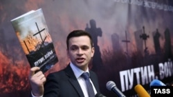 Opozicioni aktivista Ilja Jašin na predstavljanu izveštaja u Moskvi, 12 maj 2015.