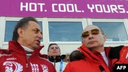 Russian President Vladimir Putin (right), shown here with Sports Minister Vitaly Mutko (left) at the 2014 Winter Olympics, has said the banned drug meldonium "has nothing to do with doping."