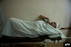 A miner wounded in the blast at a hospital in Donetsk