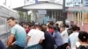 International Group Helps Repatriate Hundreds Of Tajik Citizens Stranded In Kazakhstan
