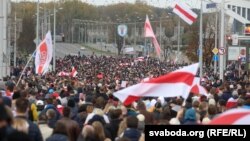 Demonstrators march in Minsk on October 25.