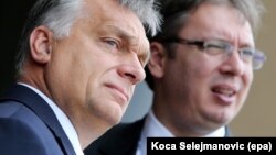 Hungarian Prime Minister Viktor Orban (left) and Serbian Prime Minister Aleksandar Vucic both come under sharp criticism by Freedom House for their treatment of the press.