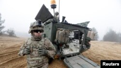 Американские военнослужащие начали боевое дежурство в странах Балтии в 2014 году