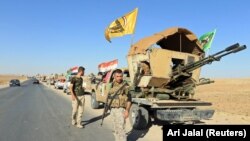Shi'ite Popular Mobilization Forces (PMF) are seen in Zumar, Nineveh province, October 18, 2017