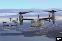 Фото від Корпусу морської піхоти США: три літаки MV-22B Osprey летять над Тихим океаном