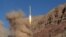 A long-range ballistic missile is launched in the Alborz mountain range in northern Iran, March 9, 2016
