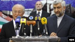 Iran -- Irans chief nuclear negotiator Saied Jalil and International Atomic Energy Agency (IAEA) chief Yukiya Amano (L) address a joint press conference, in Tehran, 21May2012