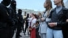 Women join protests in central Minsk on September 1. 