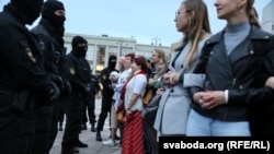 Women join protests in central Minsk on September 1. 