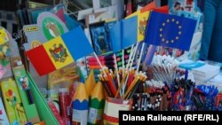 Moldova - flags of Moldova (tricolor) and EU, school supplies, 29Aug2011