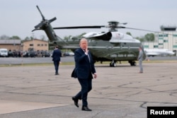 ABŞ prezidenti Donald Tramp Merilend ştatındakı Endryus Birgə Hərbi Bazasına getmək üçün "Air Force One" təyyarəsinə minir.