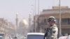 Polish troops, like this one patrolling Karbala in 2003, is the only country other than the U.S. or Britain to have had a full division in Iraq.