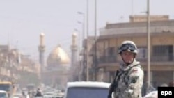 Polish troops, like this one patrolling Karbala in 2003, is the only country other than the U.S. or Britain to have had a full division in Iraq.