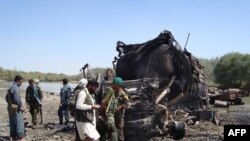 The site of a NATO air strike that destroyed two fuel tankers hijacked by the Taliban in northern Konduz Province