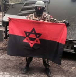 Воїн, який воює на боці України у війні з Росією. Фото зі сторінки Натана Хазіна у фейсбуці