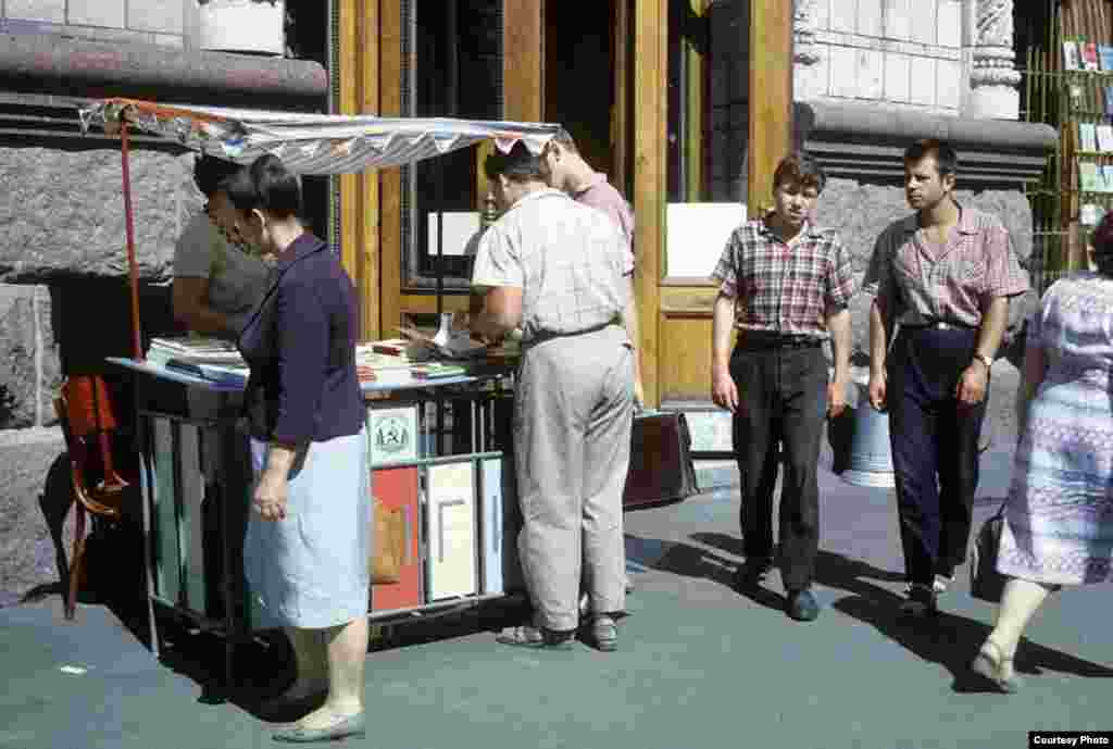 A book stand in Kyiv at the corner of Khreshchatyk and Prorizna streets, then named Sverdlov Street. The address is Khreshchatyk 30. There used to be a book store named Druzhba (Friendship) there where foreign books (but only from socialist countries, of course) could be bought.