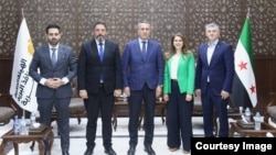 Олег Барциц (в центре) в Сирии