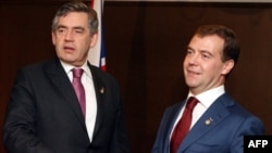 Gordon Brown (left) with Russian President Dmitry Medvedev at the G8 summit in Tokyo in July