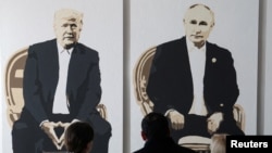 Artwork depicts U.S. President Donald Trump and Russia's Vladimir Putin at an exhibition n Yalta on the Crimean Peninsula, which Russia has illegally annexed from Ukraine. 