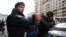 Interior Ministry officers detain a man during a protest against the razing of the Soviet-era apartment blocks outside the State Duma in Moscow on June 14.