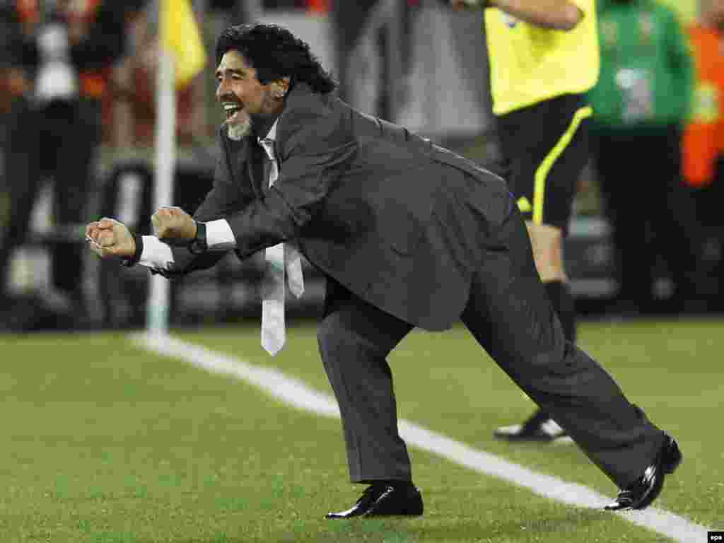 Argentine head coach Diego Maradona cheers his team during a Group B match against Greece at the 2010 FIFA World Cup in Polokwane, South Africa, on June 22. Argentina won 2-0. (Photo by Jonathan Brady/epa)