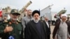 Iranian President Ebrahim Raisi (center) is seen visiting a naval base of the Islamic Revolutionary Guards Corps in Bandar Abbas in southern Iran on February 2.