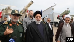 Iranian President Ebrahim Raisi (center) is seen visiting a naval base of the Islamic Revolutionary Guards Corps in Bandar Abbas in southern Iran on February 2.