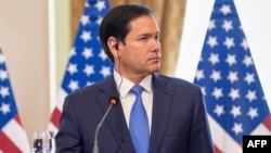 US Secretary of State Marco Rubio listens to translations during a joint news conference with Slovakia's Prime Minister in Bratislava, Slovakia, on February 15, 2026.