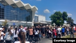 Protesters commemorate the victims of the canopy collapse outside Novi Sad's railway station on May 1.