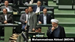 Iranian President Hassan Rouhani appeared before parliament on Aug. 28 to answer questions on his government's handling of Iran's economic struggles.