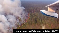 Лесной пожар в Красноярском крае России. 30 июля 2019 года.