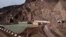 The dam sits on the Vakhsh River.