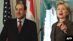 Iraqi Prime Minister Nuri Al-Maliki and U.S. Secretary of State Hillary Clinton opened the investment conference