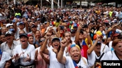 Protesters gather in support of Venezuelan opposition leader Juan Guaido on International Women's Day. 