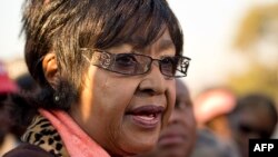 Winnie Madikizela-Mandela. Nelson Mandela's ex-wife, speaks to the media outside their first family home in Soweto on June 28.