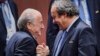 Sepp Blatter (solda) və Michel Platini 2015-ci ildə