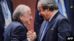 FIFA President Sepp Blatter (left) has slammed the UEFA head Michel Platini (right) over a corruption investigation into the workings of world soccer's governing body. 