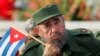 Cuban President Fidel Castro listens to a speaker during the May Day parade in Havana's Revolution Square in 2005. 