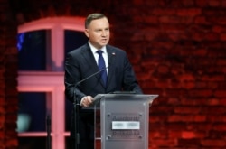 Polish President Andrzej Duda speaks during the ceremonies marking the 75th anniversary of the liberation of Auschwitz-Birkenau in Oswiecim, Poland.