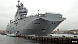 A French Navy Mistral amphibious assault ship docked on the Neva River in central St. Petersburg in November