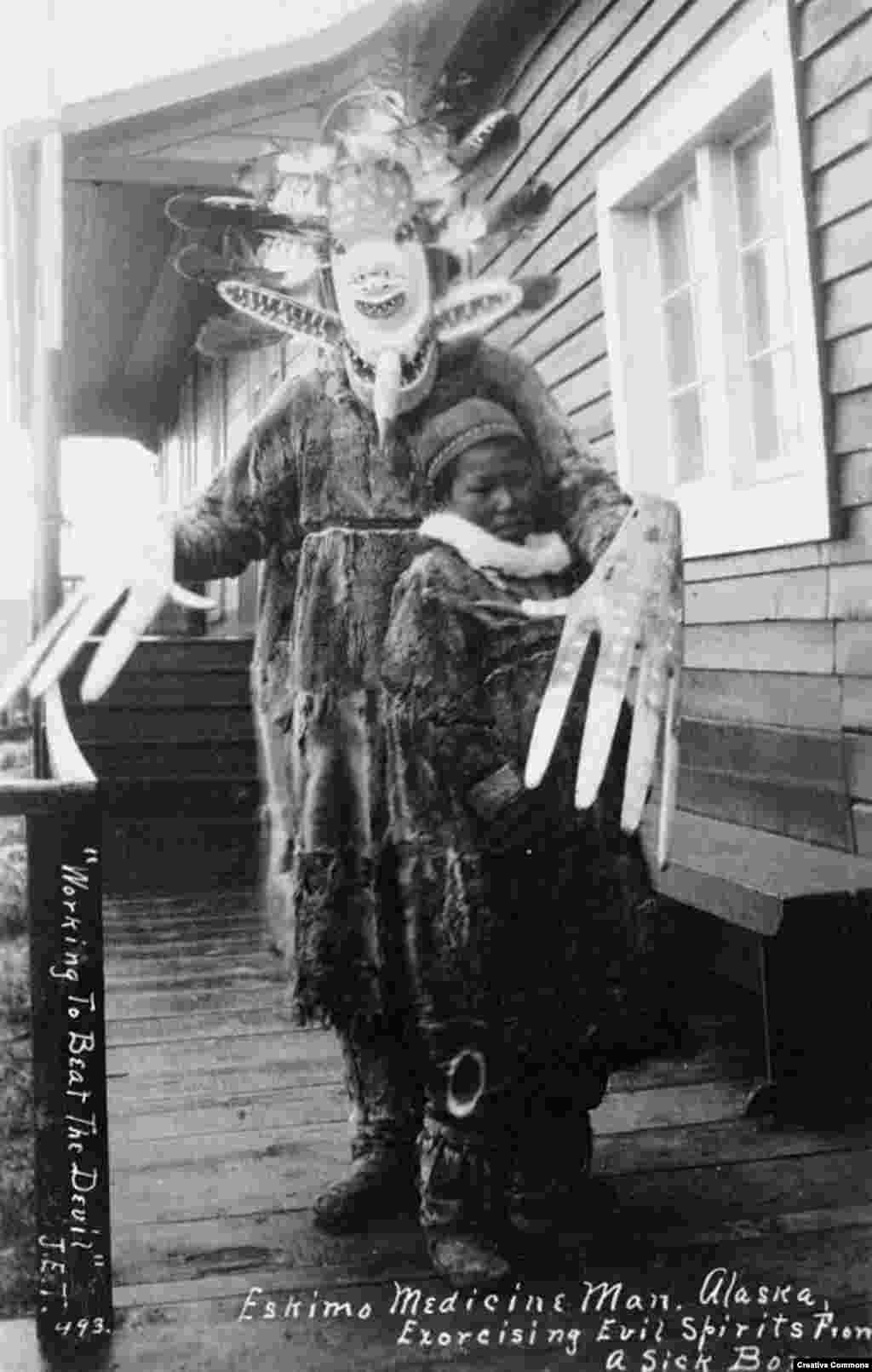 In a photograph from 1890 titled Working To Beat The Devil, a shaman in Alaska stands with a sick boy. Shamanism dates back to the age of stone tools and hunting and gathering. In today's Czech Republic the remains of a female shaman were unearthed that dated back to 30,000 B.C.