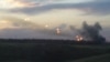 Запуск ракет з ракетної системи залпового вогню «Град», орієнтовно з району російського міста Гуково Ростовської області, 16 липня 2014 року (скріншот з аматорського відео)