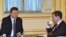 Russian President Dmitry Medvedev (right) drinks tea with Ukrainian President Viktor Yanukovych at the Kremlin.