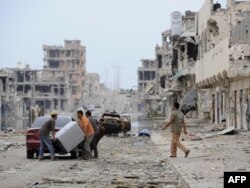 От ливийского Сирта остались одни руины в результате ожесточенных боев между повстанцами и сторонниками Каддафи