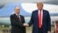 US President Donald Trump greets Russian President Vladimir Putin on the tarmac after they arrived in Anchorage, Alaska, on August 15.