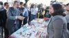 Armenia - Prime Minister Nikol Pashinian talks to a trader while visiting a Syrian-Armenian arts and crafts fair in Yerevan, 17 October 2018.