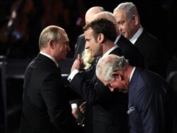 В поисках "Ялты-2": Владимир Путин и Эммануэль Макрон, высказывающийся в пользу активизации диалога с Кремлем